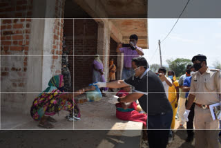 Deputy Commissioner distributed food between poor people