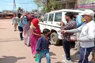 people providing food to workers