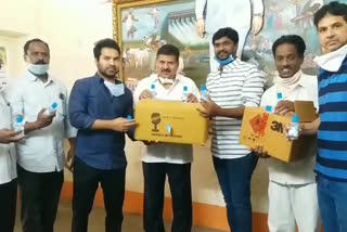 Thalasani Sai And MLA Muta Gopal Distributes Sanitizer bottles