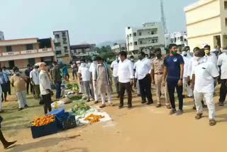 Minister Muttamshetti Srinivas inspected the vegetable market at Chodavaram