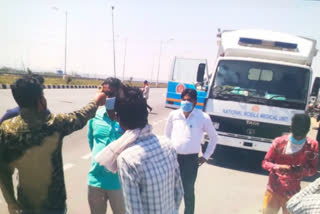 mdical Mobile unit set up in Nuh for health checkup of migrant laborers during lockdown