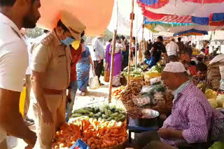 An officer of the Department of Measurements, who inspected the vegetable stalls