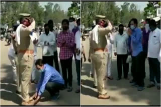 Araku MLA Chetti Phalguna touches feet