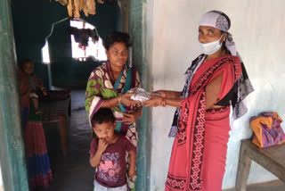 Anganwadi workers distributing ready-to-eat nutritional food from door to door in Balodabazar