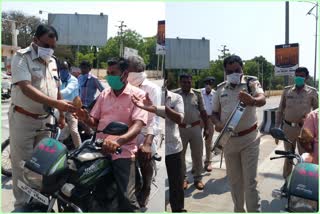 koppala  police giving coconuts to motorists