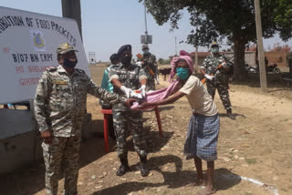 CRPF distributed grains and sanitizers in giridih