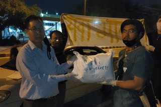 RSS workers distribute ration to north east students