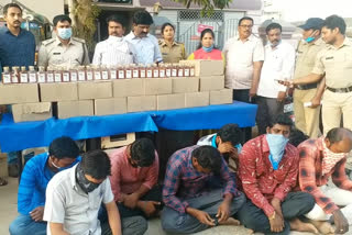 Police suspended for cooperating with illegal liquor business at hindupuram in ananthapuram