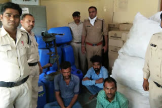 Garoth police arrested two people while transporting illegal liquor