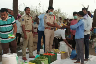 Donors distributing essentials to migrants in Khammam district Vaira