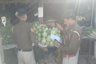 Police checks rate list of vegetables in Jwalamukhi