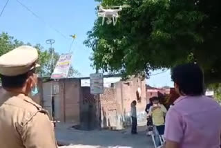 police keeping an eye with drone camera