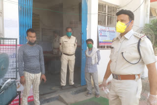 Full body sanitation outside the police station in satna