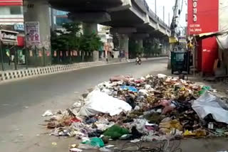due to lockdown garbage is gathered at dwarka navada metro station road in delhi