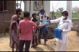 Former MLAs are distributing masks in rural areas