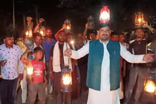 rjd leader arunesh yadav lit lalten in bihar sharif at 9 pm