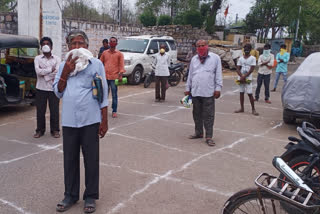 Public received ration while maintaining social distance