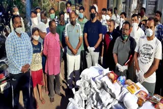 Jain community distributing groceries