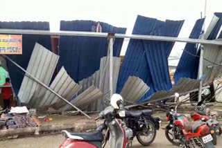 Shop sheets that were fallen due to heavy rain and wind
