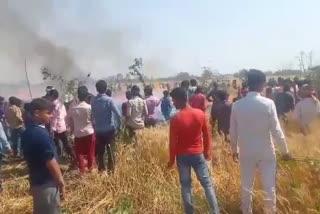 wheat field caught fire