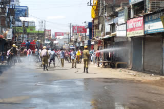 sodium-hydrocloriad-are-spread-to-prevent-corona-infection-in-durgapur-west-burdwan