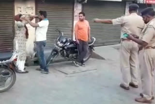 lady and police fight in shahbad