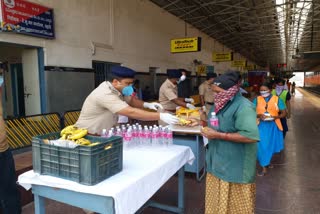 RPF officers distrubuting food for railway d group employees