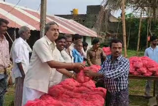 Distribution of vegetable to the poor in Kondapalli