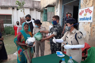 police distributed food to poor people in munger