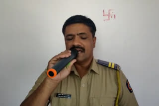 Nandurbar Police urge people to stay in home by his own song