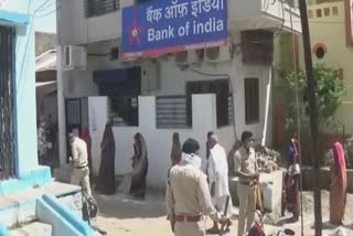 Crowd of account holders in bank