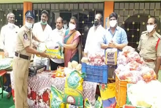 MLA roja distributes essential commodities to the police at puthuru in chittoor