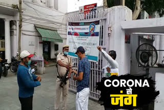 Police giving sanitization before entering police station during corona.