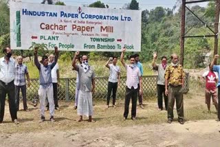 Paper mill employee protests against government