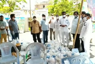 food distribute to the persons working in lockdown in west godavari dst