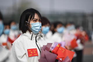China reports nearly 100 new coronavirus cases in one day, highest in recent weeks