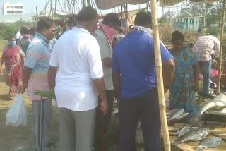 People buying goods in groups in Srikakulam district