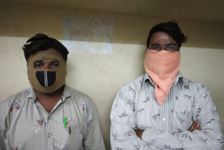 spit on road two people are arrested in rangareddy