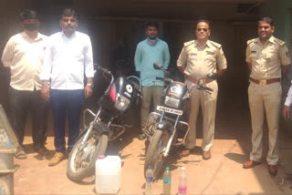 8.Ltr liquir and 2 bikes seized