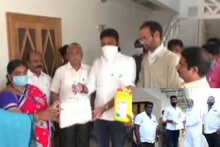 minister kodali nani distributed sanitizes to volunteers