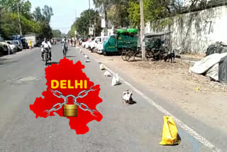 People queuing utensils in Jahangirpuri