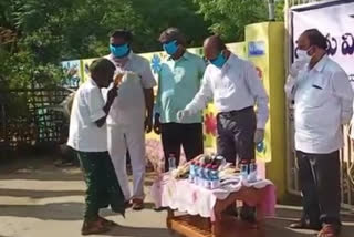 Distribution of masks and sanitizers in Kanigiri