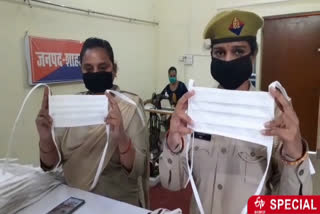 female policemen are preparing masks