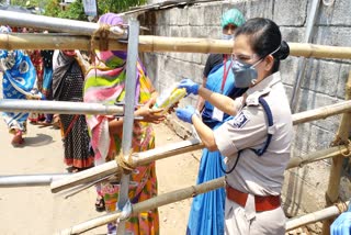 DCP Sagarika distribute sanitary napkins to all women