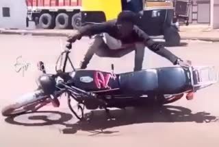 Youth made bike stunt in middle of the road at Hubli