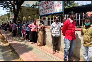 People standing in queue for emergency traffic clearance