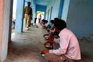 poor people eating in community kitchen in purnea