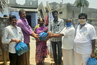 Business man distributes essential goods to 500 families