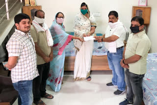 Sand traders donated PPE kit to collector in vidisha