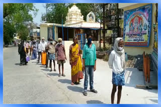 beggars and poor people waiting for food from morning in bhadrachalam